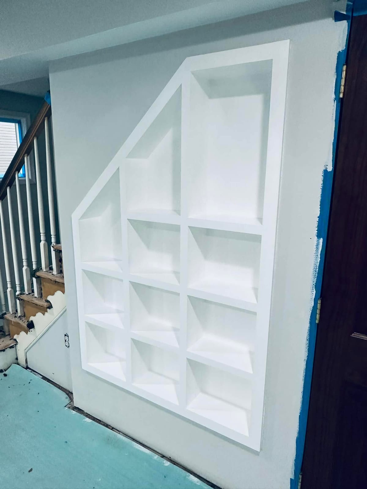 Custom Built-In Staircase Shelving