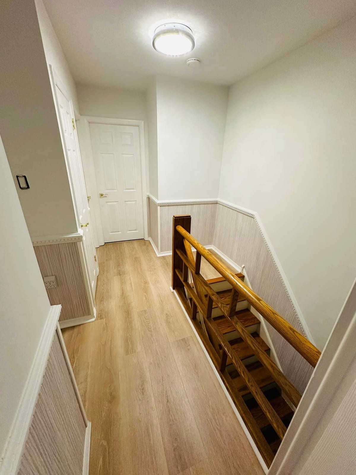 Interior Renovation with Wall Panels & Laminate Flooring