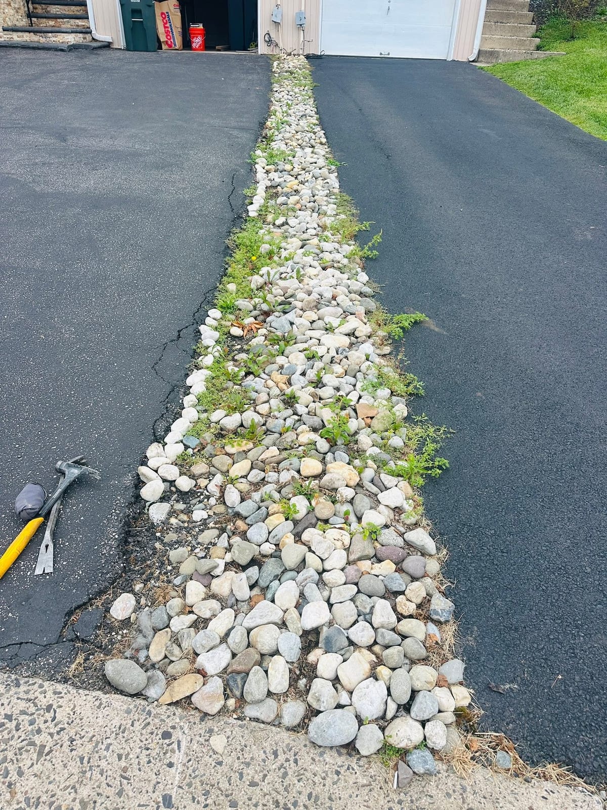 Driveway Divider Reconstruction with Concrete Pavers — before